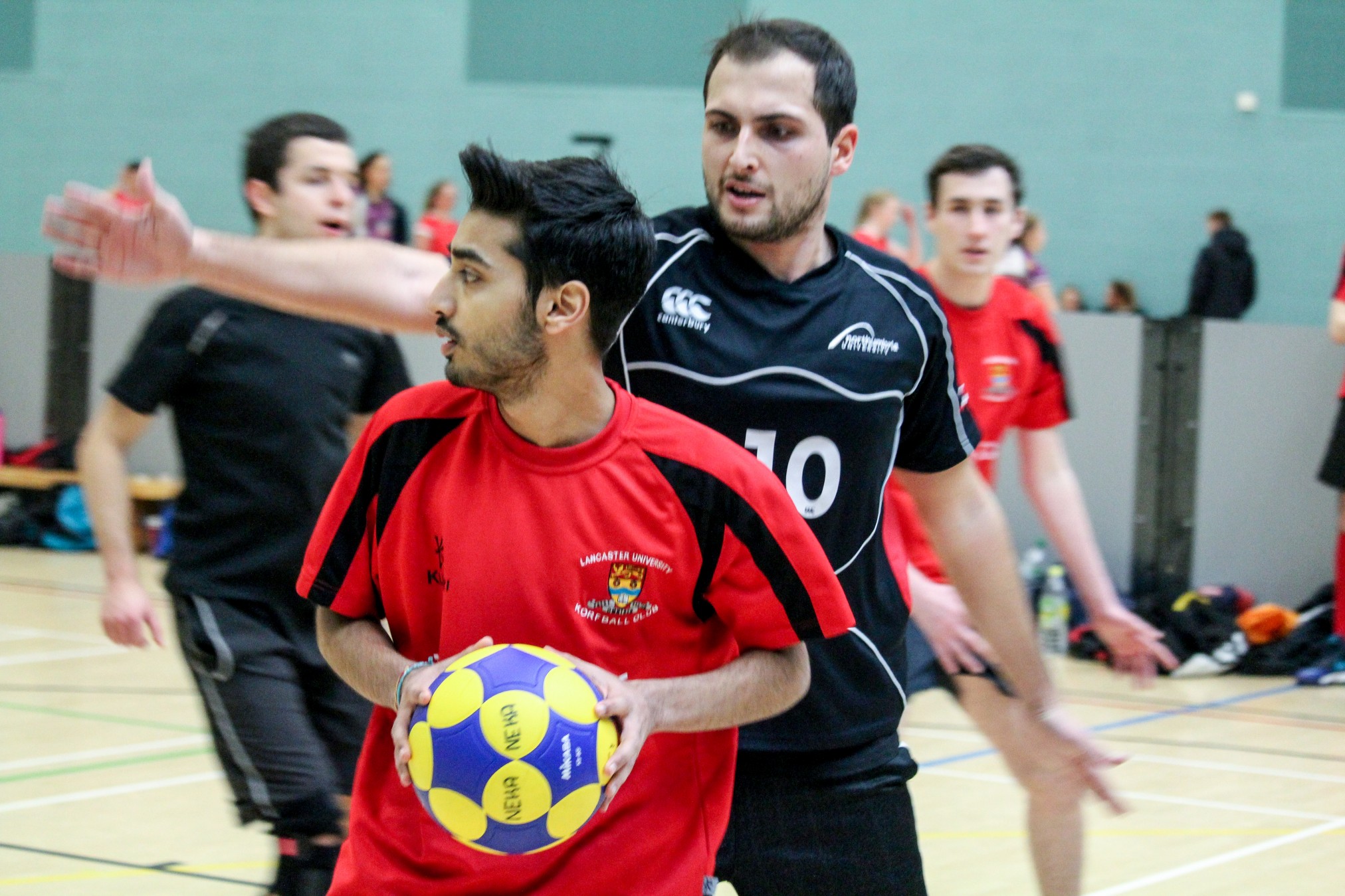 Trying to beat the defender. Photograph: Ian Meeks