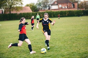 Lancaster going in for the tackle. Photograph: Lee Brown.