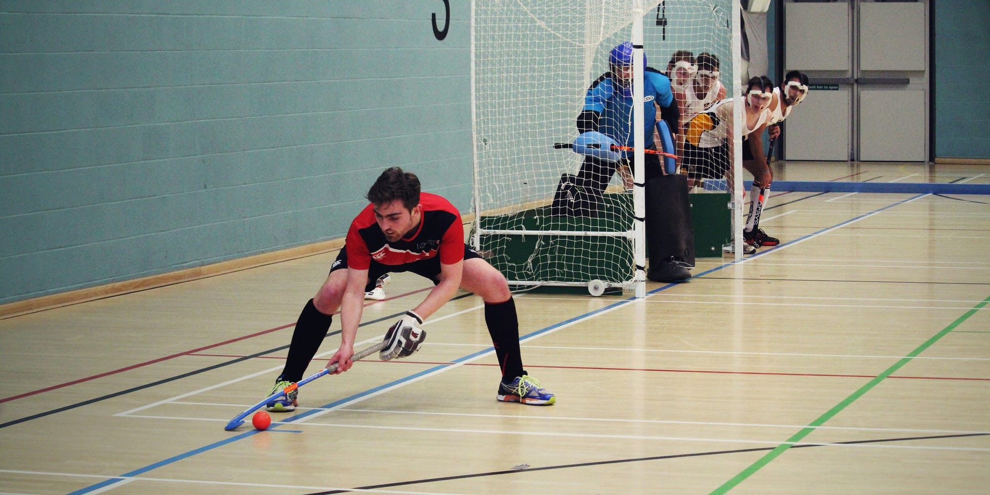 Men's indoor hockey 1sts improve on last year