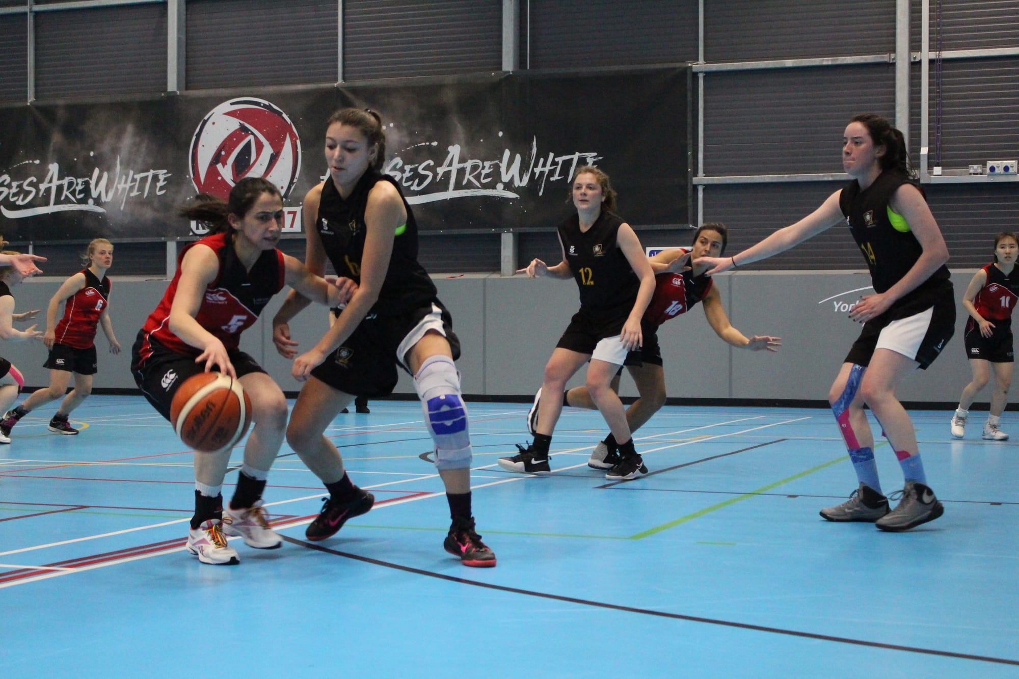 Women avenge the men in basketball