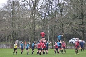 Cats Rout John Moores to Reach Semis